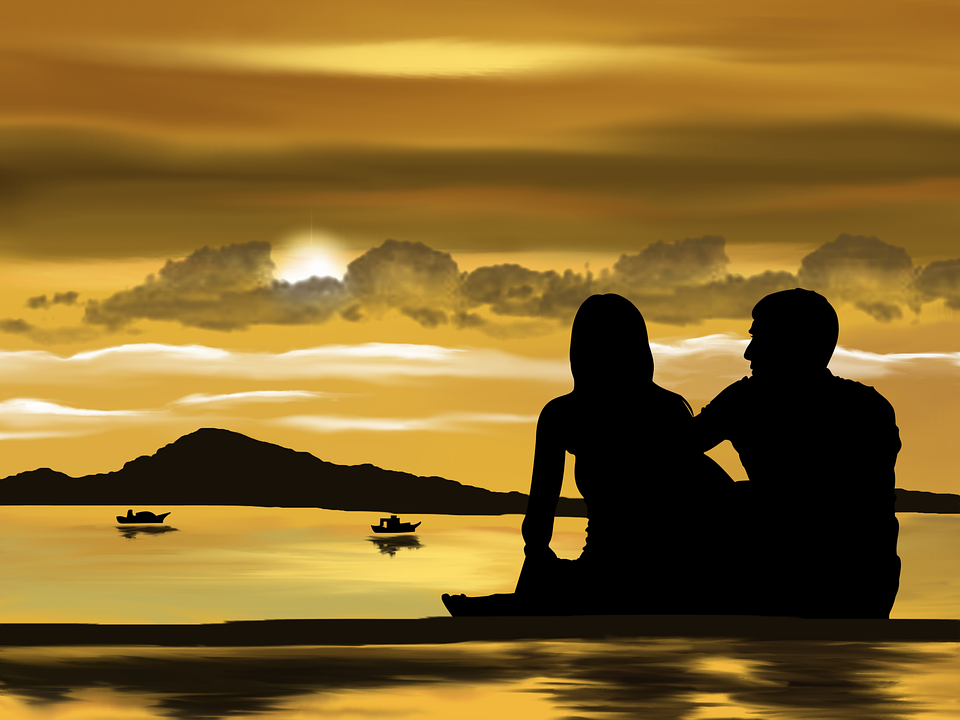 couple at sunset beach