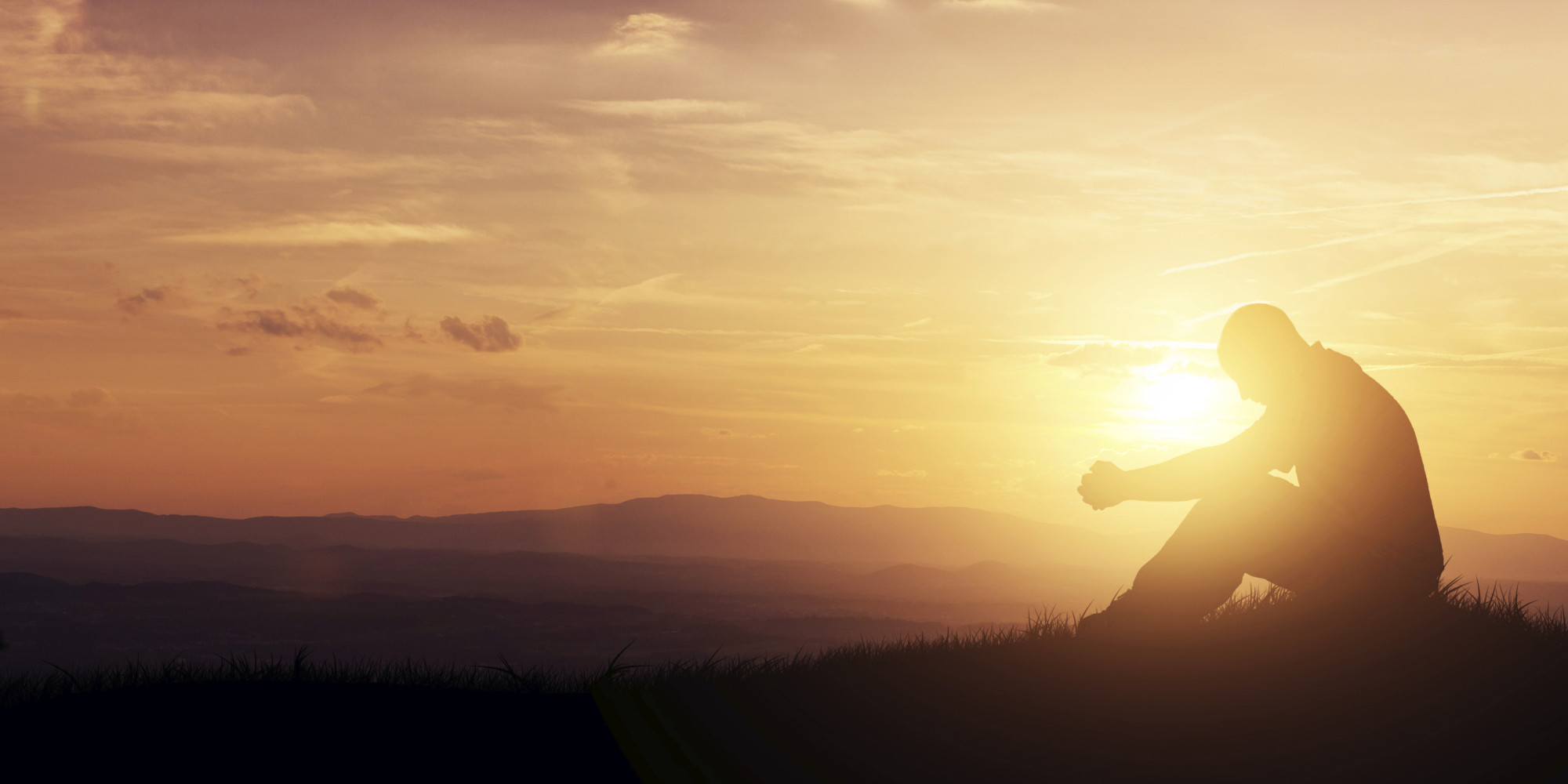 Man Praying Sunset